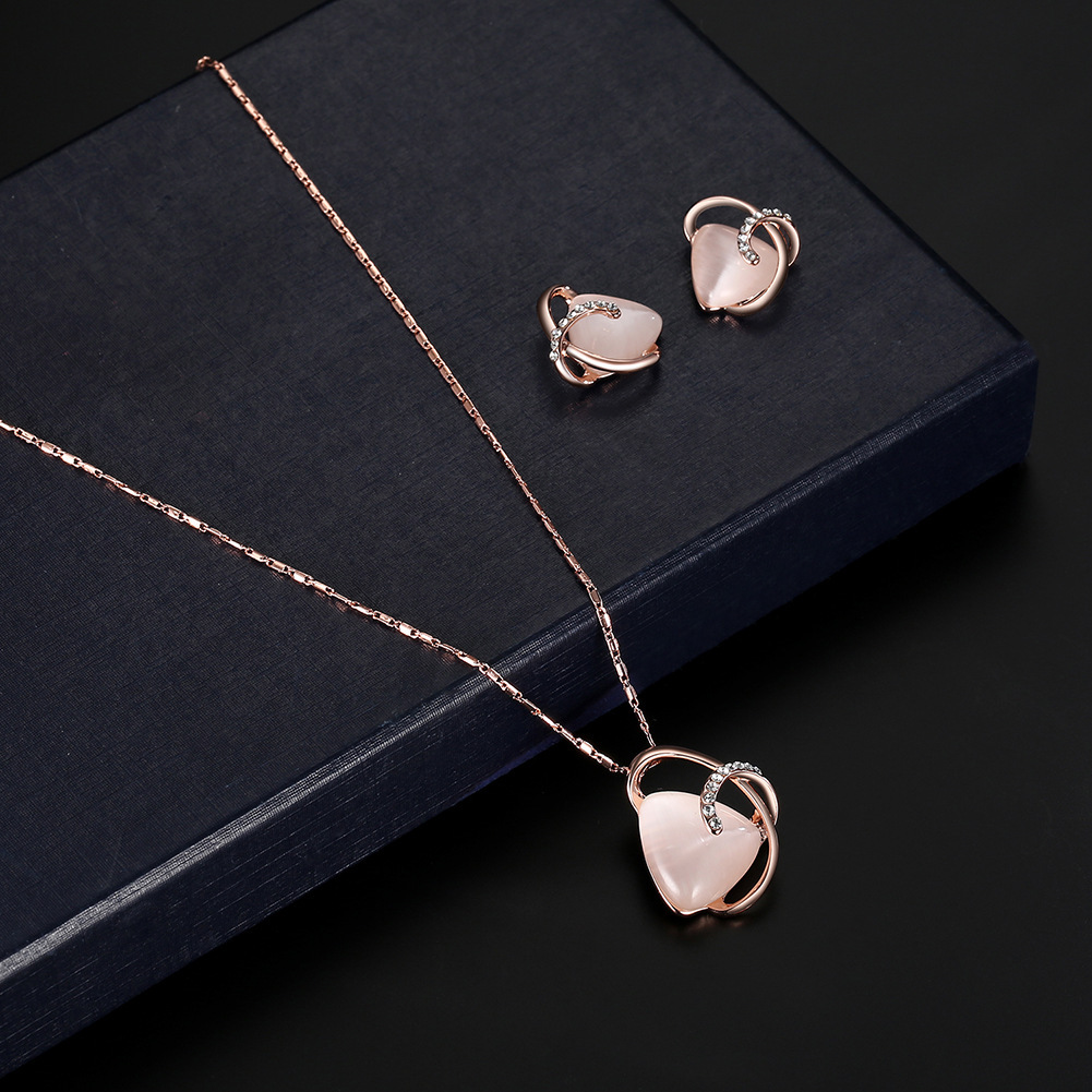 rose gold necklace and earrings jewelry set with pink gemstone accents